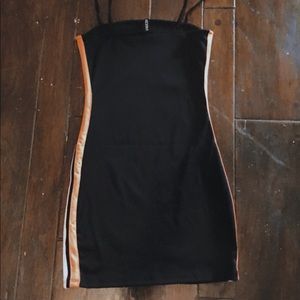 It’s a dress Black with pink colors